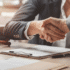 rofessional mediation session in Columbus, Ohio, with two parties reaching an agreement with the help of a neutral mediator.