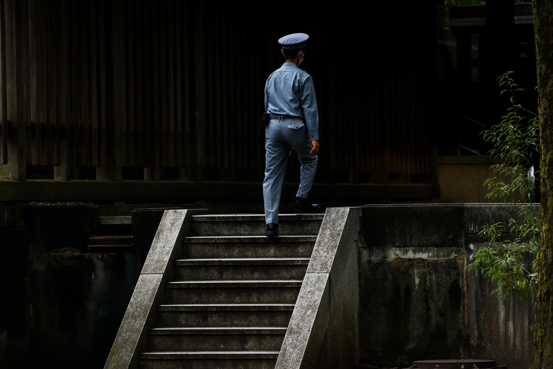 Woman practicing meditation indoors, highlighting calmness and mindfulness.