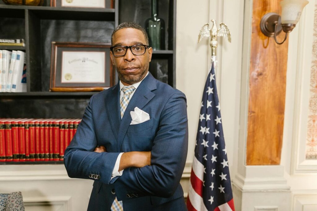 A bride and groom celebrating their wedding indoors with floral decorations.