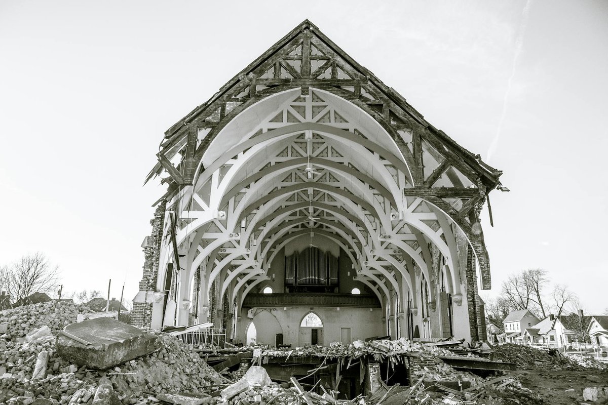 Partially demolished church showing exposed architecture in Columbus, IN.