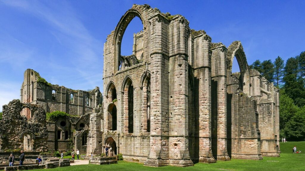 Explore the historic ruins of Fountains Abbey, a UNESCO World Heritage site in Yorkshire, England.