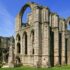 Explore the historic ruins of Fountains Abbey, a UNESCO World Heritage site in Yorkshire, England.