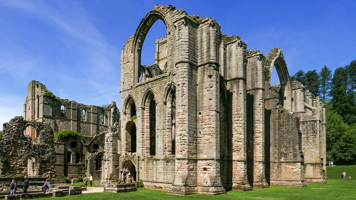 Explore the historic ruins of Fountains Abbey, a UNESCO World Heritage site in Yorkshire, England.