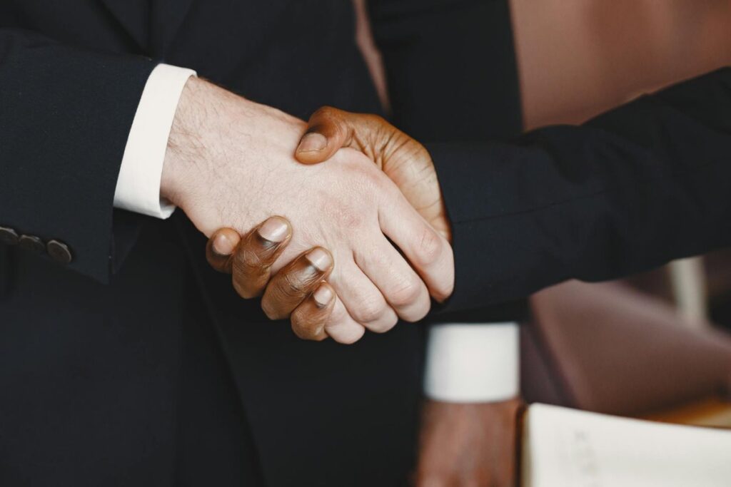 Close-up of a professional handshake symbolizing partnership and agreement.