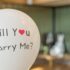 A romantic balloon with 'Will You Marry Me?' for a heartfelt marriage proposal.